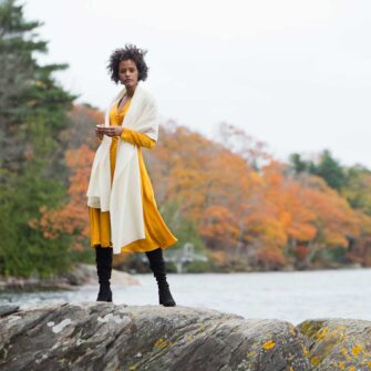 Swans Island Boothbay Wraps. Handwoven with a soft merino wool / silk blend. Made in Maine. Shown here in undyed natural Ivory color.