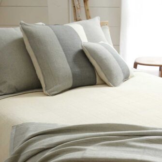 Swans Island Company's Maine Coast Pillows. Handwoven in Maine with soft hand-dyed organic merino wool. Shown in Charcoal.