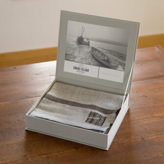 Swans Island Company's Island Throws come in this beautiful linen gift box.