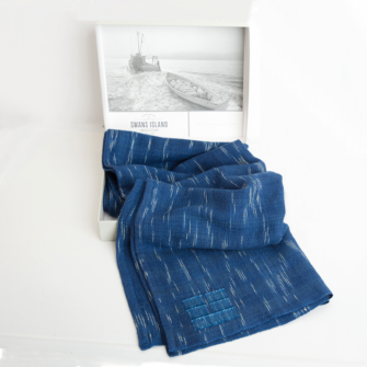 The Swans Island Firefly Wrap comes in our distinctive linen gift box.