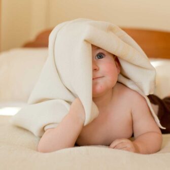 Swans Island Company's Classic Grace Baby Blanket is handwoven in Maine with extra-soft organic merino wool. Comes in a beautiful linen gift box.