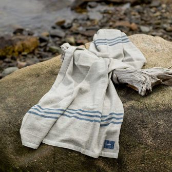 Swans Island Heritage Throw - handwoven in grey Corriedale wool with Indigo stripes