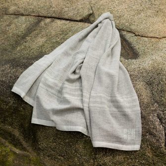 Swans Island Heritage Throw - handwoven in grey corriedale wool with White stripes
