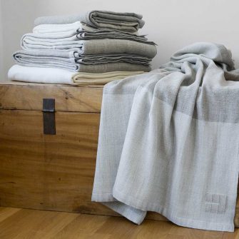 Solstice Blanket stacked and draped