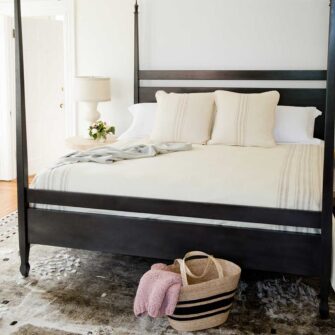 Swans Island Company's Grace Blanket in Natural with Grey. Handwoven in Maine. Shown with Grace pillows 26"