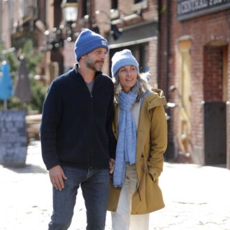 Swans Island Company's unique firefly knit accessories. Hand-dyed. Made in USA. Firefly Wrap and Firefly Hat shown here in Twilight Blue.