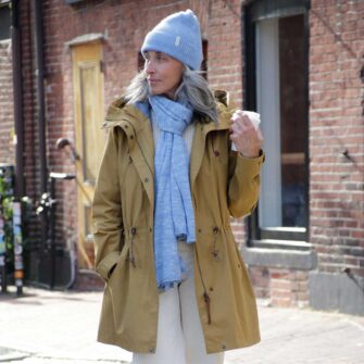 Swans Island Company's unique firefly knit accessories. Hand-dyed. Made in USA. Firefly Wrap and Firefly Hat shown here in Twilight Blue.