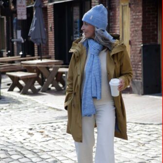 Swans Island Company's unique firefly knit accessories. Hand-dyed. Made in USA. Firefly Wrap and Firefly Hat shown here in Twilight Blue.