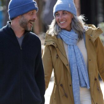Swans Island Company's unique firefly knit accessories. Hand-dyed. Made in USA. Firefly Wrap and Firefly Hat shown here in Twilight Blue.