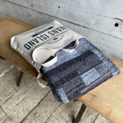 Swans Island Artisan Patchwork Throws come in a Swans Island canvas tote bag.