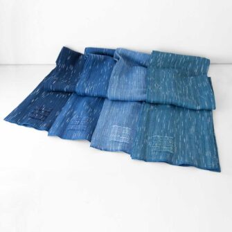 Swans Island Firefly Scarf, handwoven in Maine with hand-dyed organic merino wool in multiple blue colorways