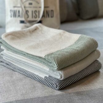 Swans Island's Everyday Cotton Throw blanket is woven in Maine with 100% American cotton.