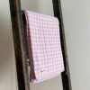 Swans Island's classic Gingham Check Throw blanket is woven in Maine with 100% natural cotton.