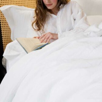 Swans Island Classic Linen Bedding Bundle. 100% French Linen, soft and substantial. Made in USA. Bedding Bundle includes one sheet set and one duvet set, shown in White.