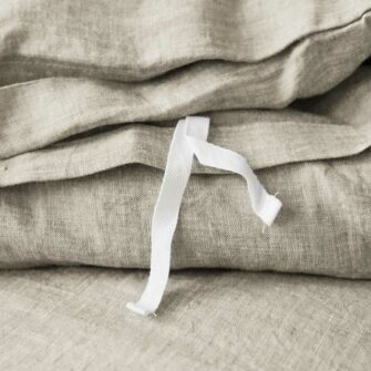 Swans Island Classic Linen Duvet Cover. 100% French Linen, soft and substantial. Made in USA. Duvet Cover shown in Flax, interior tie detail.