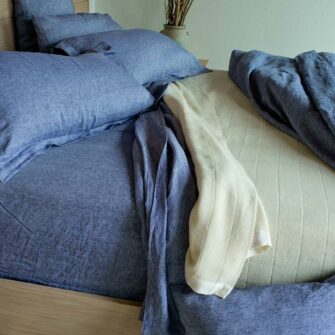 Swans Island Chambray Linen Bedding shown in Nautical Blue.