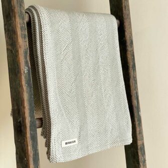 Swans Island's Savannah Throw blanket is woven in Maine with 100% natural cotton.