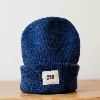 Swans Island Logo Hat - hand-dyed silk + Merino wool knit. Shown in Midnight.