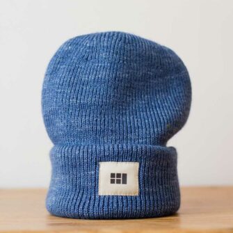 Swans Island Logo Hat - hand-dyed silk + Merino wool knit. Shown in Nautical Blue.