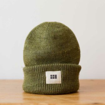Swans Island Logo Hat - hand-dyed silk + Merino wool knit. Shown in Olive.