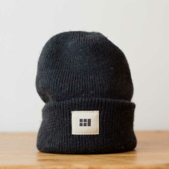Swans Island Logo Hat - hand-dyed silk + Merino wool knit. Shown in Raven.