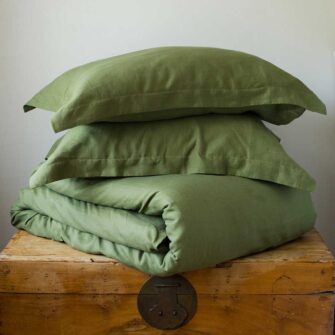 Swans Island Company's Relaxed Linen bedding is made with 100% French linen, stitched in the USA. Shown here, duvet set in Rosemary.