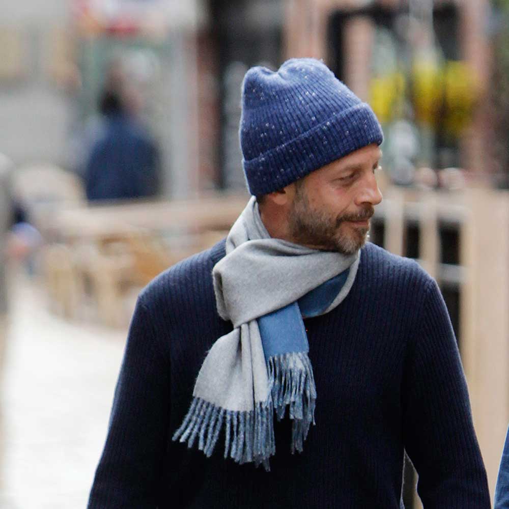 Swans Island Company's Reversible Baby Alpaca Scarf is a luxurious, soft scarf made by artisans in Peru. Unisex style for men an women. Shown here in Marine Blue /Light Grey colorway.
