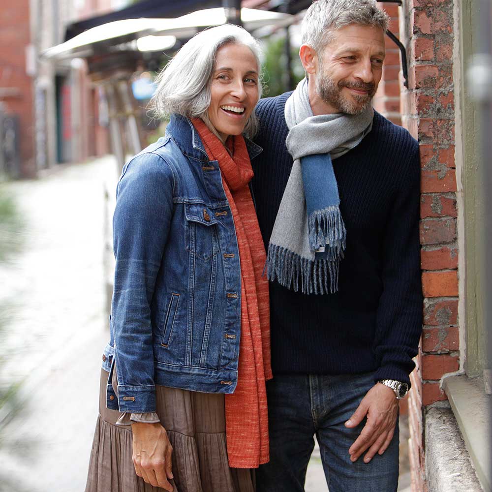 Swans Island Company's Reversible Baby Alpaca Scarf is a luxurious, soft scarf made by artisans in Peru. Unisex style for men an women. Shown here in Marine Blue /Light Grey colorway.