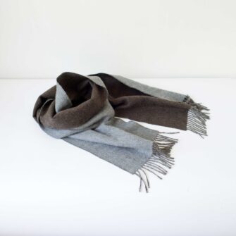 Swans Island Company's Reversible Baby Alpaca Scarf is a luxurious, soft scarf for men and women. Shown here in Taupe / Lt. Grey colorway. Swatch