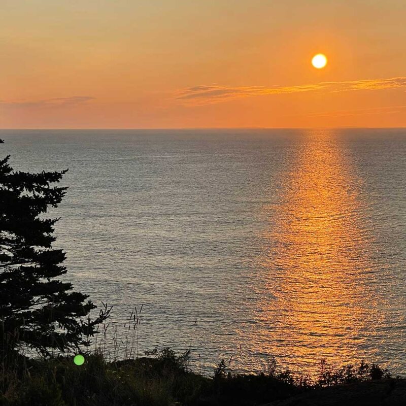 Swans Island Company's Limited Edition Ocean throws were inspired by the rugged shores of Maine. Sunrise, Monhegan Island, Maine 2023.