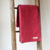 Swans Island Company's Caroline Throw. 100% Cotton throw with bands of woven texture. Made in USA with 100% American cotton. Shown here in Raspberry.
