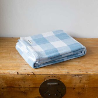 Swans Island Company's Cotton Gingham XL Check Blanket - woven in Maine on antique looms. Made with 100% soft American cotton. Shown here in Blue & White.