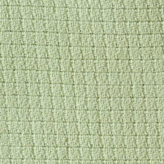 Swans Island Company's Tuscany blanket is woven in Maine with soft 100% American Cotton. Shown here in Celadon