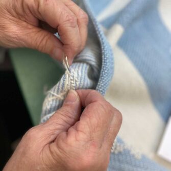 Swans Island Company offers unique hand-stitched monogramming on select baby blankets, throws and blankets. Make your gift unique with a custom monogram. Stitched by hand in the USA.