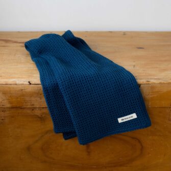 Swans Island Company's Cotton Waffle Toddler Blanket is squishy and soft - perfect for tender babes. Made in Maine with 100% American cotton. Shown here in Deep Indigo.