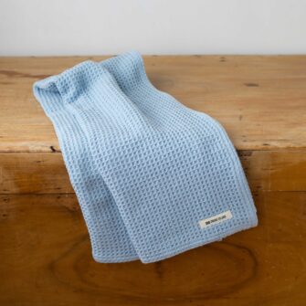 Swans Island Company's Cotton Waffle Toddler Blanket is squishy and soft - perfect for tender babes. Made in Maine with 100% American cotton. Shown here in Delft Blue.