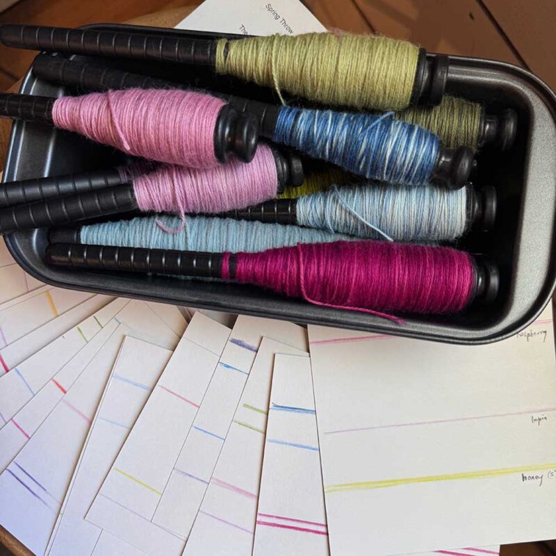 yarn bobbins in tray