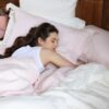Swans Island Company's Relaxed Linen Bedding. Elegant French linen stitched in the USA for those seeking a refined and timeless sleep experience. Shown here in Blush.