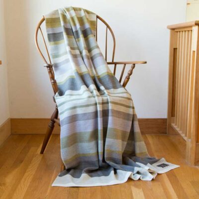 striped throw draped on chair