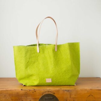Swans Island Company's Hana Beach Tote by Graf Lantz. Cotton Canvas with leather strap. Shown here in Kiwi.
