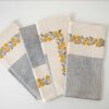 Swans Island Company's Meehak Napkins by Soil to Studio. Block printed by hand in India with bright playful patterns. Shown here in Natural with daffodil yellow and blue. Set of 4.