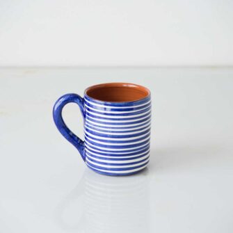 Swans Island Compass Classic Terracotta Striped Mug. Handcrafted in Portugal. Shown here in Blue.