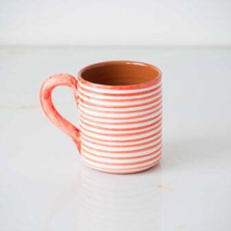 Swans Island Compass Classic Terracotta Striped Mug. Handcrafted in Portugal. Shown here in Red.