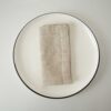 Swans Island Company's linen napkins by Linen Tales, made with 100% European Linen Oeko-Tex® and EUROPEN FLAX® certified. Made with stonewashed soft linen with mitered corners for a crisp edge. Shown here in Natural Flax color.