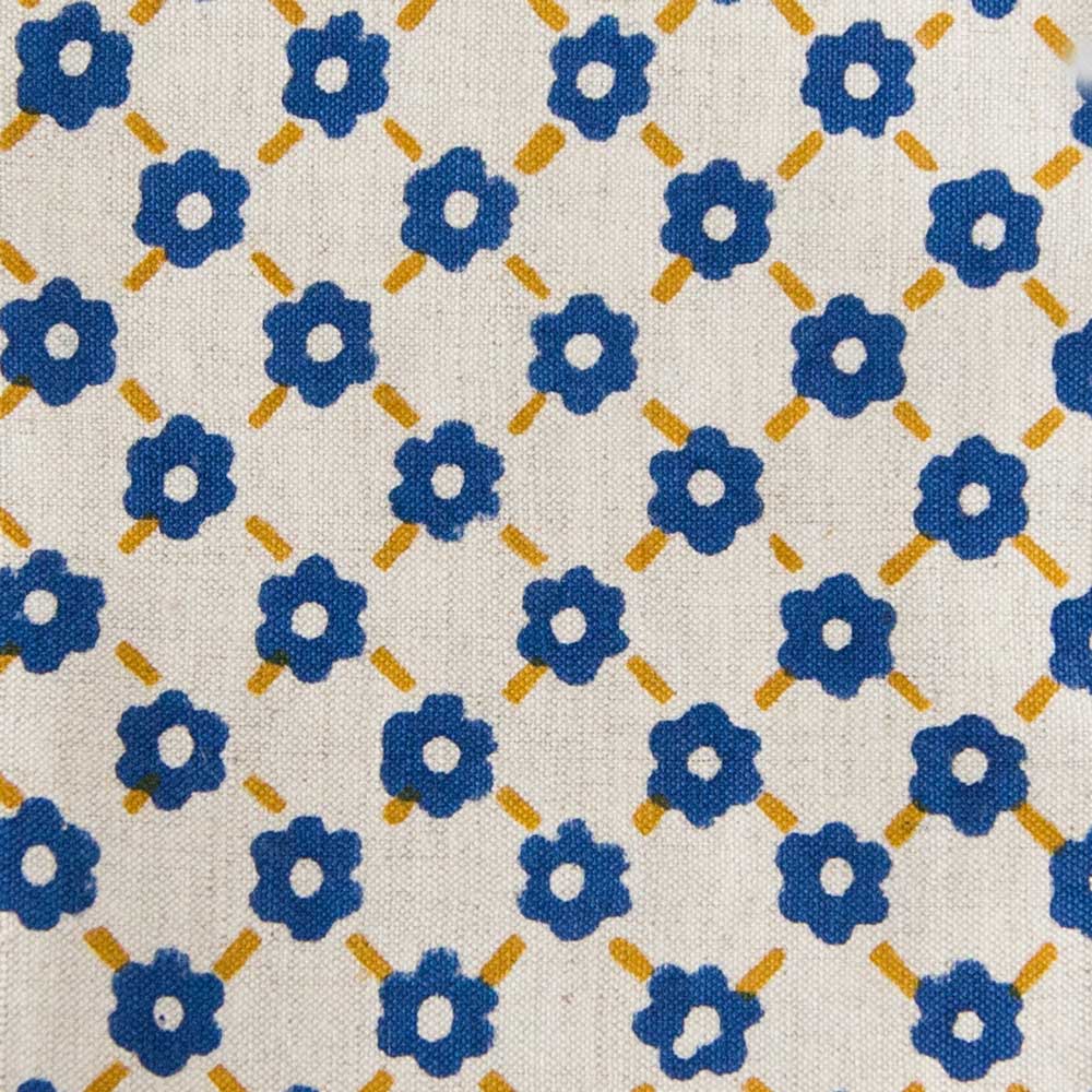 Swans Island Company's Pia Napkins by Soil to Studio. Block printed by hand in India with bright playful patterns. Shown here in Natural with yellow and blue. Swatch