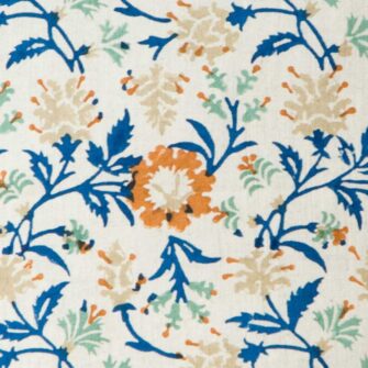 Swans Island Priya Pillow Cover by Soil to Studio. Block printed by hand in India with bright playful patterns. Shown here in natural with blue vine. Swatch