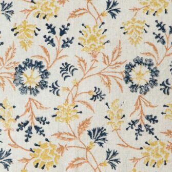 Swans Island Uma Pillow Cover by Soil to Studio. Block printed by hand in India with bright playful patterns. Shown here in natural with blue floral. Swatch