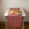 Swans Island Company's linen table runner by Linen Tales, made with 100% European Linen Oeko-Tex® and EUROPEN FLAX® certified. Made with stonewashed soft linen with mitered corners for a crisp edge. Shown here in Red and Natural Flax Gingham Check.