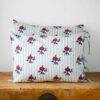 Swans Island Company's Supriya Shams by Soil to Studio. Block printed by hand in India with bright playful patterns. Shown here in Aqua with red roses.