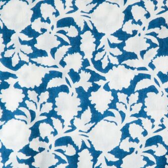 Swans Island Company's Amna pattern by Soil to Studio. Block printed by hand in India with bright playful patterns. Shown here in blue/natural. Swatch